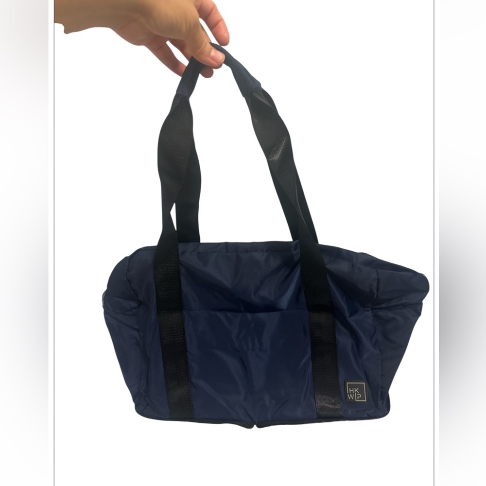 Blue and Black Duffel Bags with Durable Fabric and Leather Accents